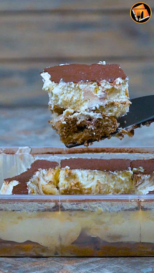 Mascarpone Cake slice being lifted by spoon